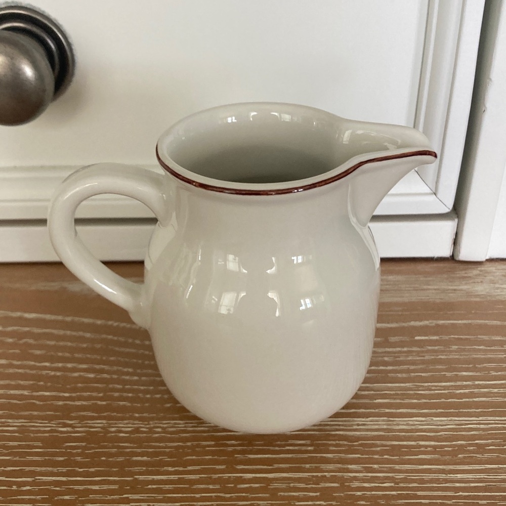 White Ceramic Creamer with brown Trim